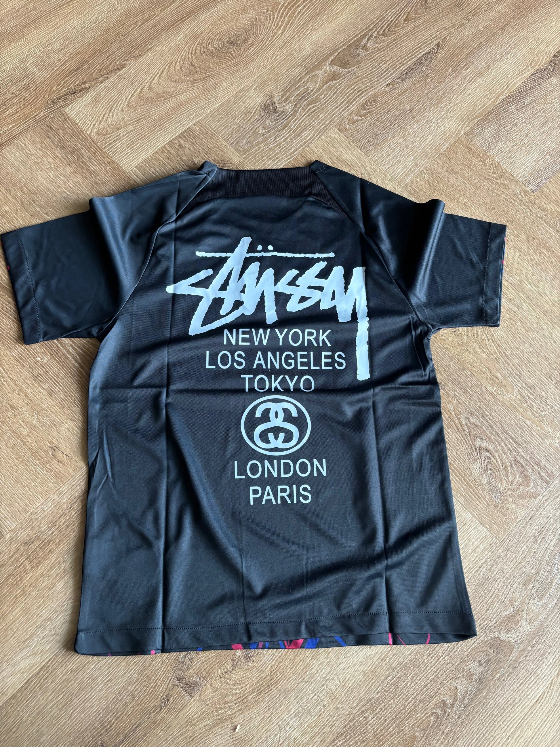 STÜSSY x PATTA “BARCELONA” JERSEY CMY