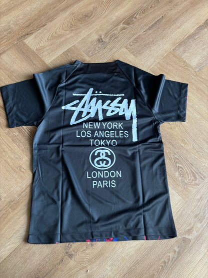 STÜSSY x PATTA “BARCELONA” JERSEY CMY